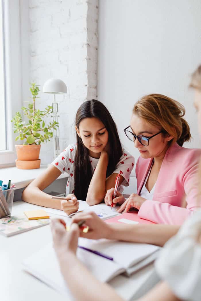 educator working with teenager